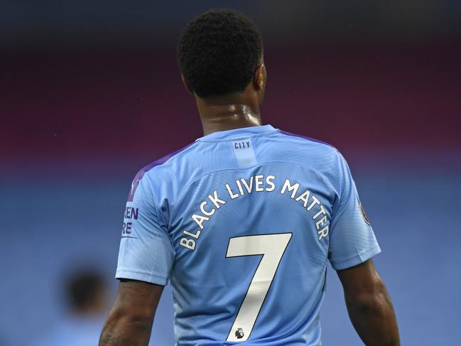 Manchester City's Raheem Sterling stands on the pitch during the English Premier League soccer match between Manchester City and Arsenal at the Etihad Stadium in Manchester, England, Wednesday, June 17, 2020. The English Premier League resumes Wednesday after its three-month suspension because of the coronavirus outbreak. (Peter Powell/Pool via AP)