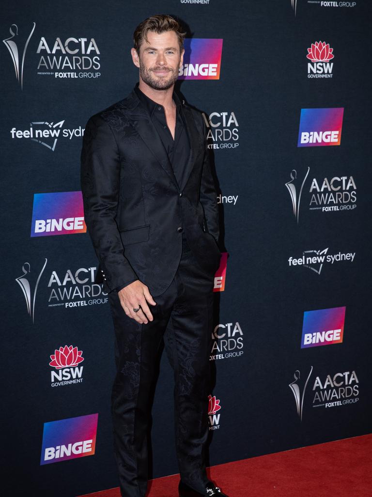 Chris Hemsworth wore an all black suit while gracing the red carpet. He will be presented with the Trailblazer Award tonight. Picture: NCA NewsWire / Christian Gilles