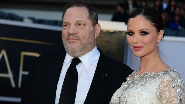 Harvey Weinstein with his former wife US designer Georgina Chapman at the Oscars in 2013. Picture: AFP