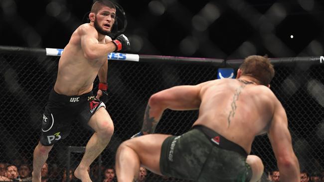 Nurmagomedov chases down Conor McGregor in Las Vegas. (Harry How/Getty Images/AFP)