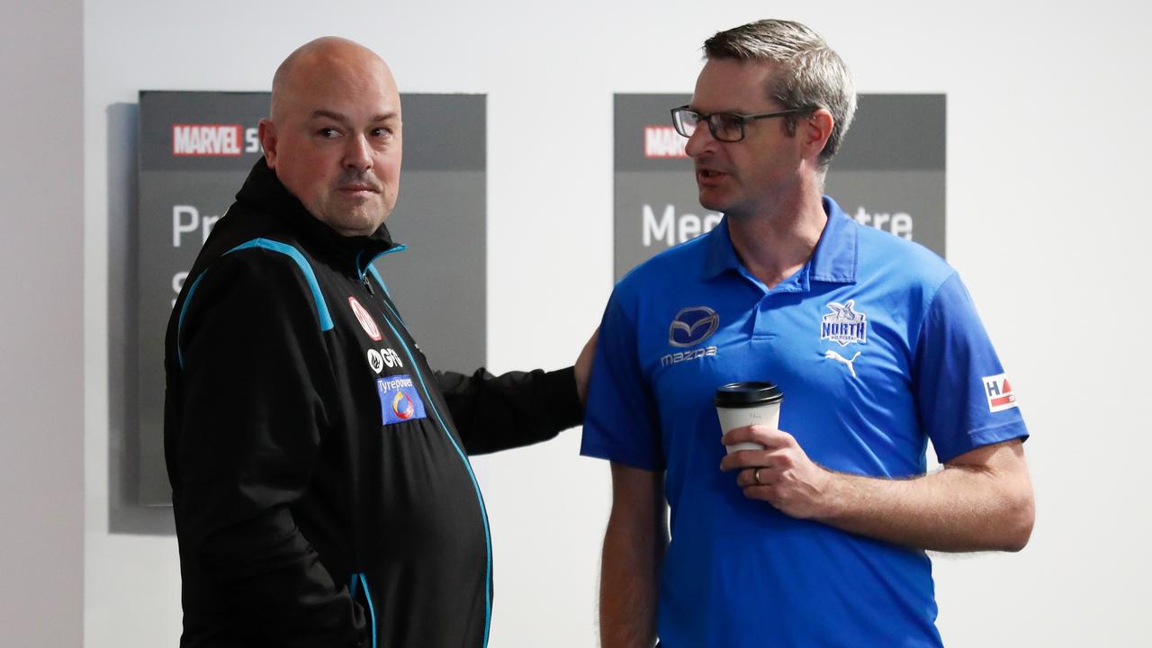 MELBOURNE, AUSTRALIA - OCTOBER 03: Chris Davies, GM of Football of the Power (left) and Brady Rawlings, GM of Football of the Kangaroos chat during The 2022 Continental Tyres AFL Trade Period at Marvel Stadium on October 03, 2022 in Melbourne, Australia. (Photo by Michael Willson/AFL Photos via Getty Images)