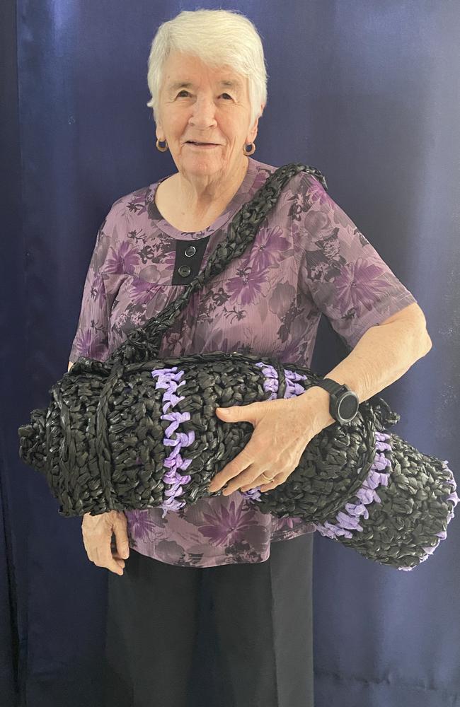 Mary Worbey – the original mat maker with one of her mats that was still in use 2 years after it hit the streets. Photo: contributed.