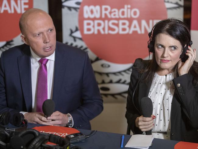 Minister for Home Affairs Peter Dutton and Labor candidate for Dickson Ali France are seen during a debate at the Pine River Bowls Club in Bray Park, Brisbane, Tuesday, April 16, 2019. (AAP Image/Glenn Hunt) NO ARCHIVING