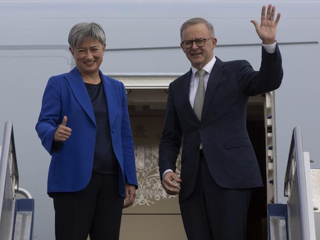 Minister Wong gives the thumbs up as the PM waves. Picture: NCA NewsWire / Andrew Taylor