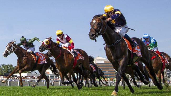 *ALTERNATIVE CROP* Jockey Michael Dee rides Alabama Express to victory from  Craig Williams riding Fierce Impact and Jockey Mark Zahra riding Kings Will Dream (L) in race 8, the Neds C.f. Orr Stakes, during Caulfield Orr Stakes at Caulfield Racecourse in Melbourne, Saturday, February 8, 2020. (AAP Image/Vince Caligiuri) NO ARCHIVING, EDITORIAL USE ONLY