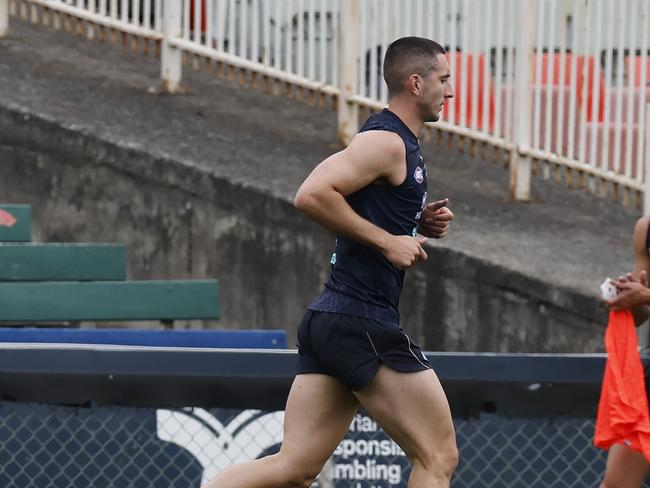 MELBOURNE , AUSTRALIA. February 16, 2024.  AFL. Carlton training at Princes Park, Carlton.  Jacob Weitering of the Blues doing slow running  during training today  . Pic: Michael Klein