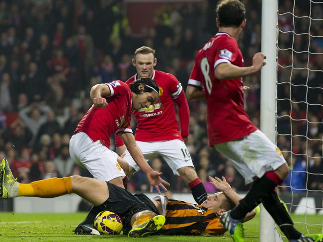 Desperate Hull defending keeps Radamel Falcao at bay.