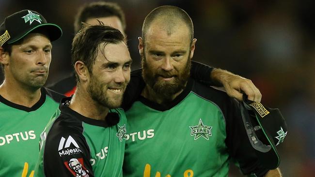 Glenn Maxwell (L) gives then Melbourne Stars teammate Rob Quiney a post-game hug. Picture: Wayne Ludbey