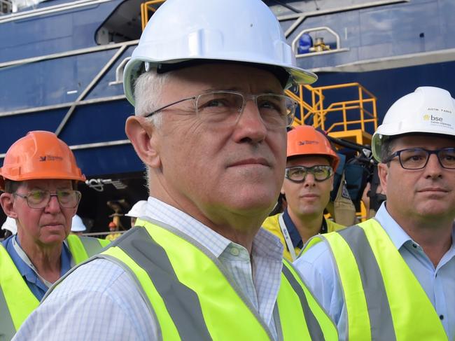 Australian Prime Minister Malcolm Turnbull takes a tour of the Norship Marine shipyards in the seat of Leichhardt in Cairns, Wednesday, May 18, 2016. Leichhardt is held by Coalition MP Warren Entsch. (AAP Image/Lukas Coch) NO ARCHIVING