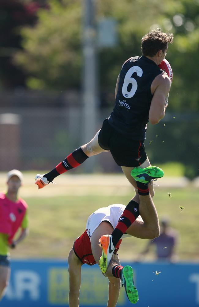 Joe Daniher marks over Kyle Langford. Picture: Wayne Ludbey