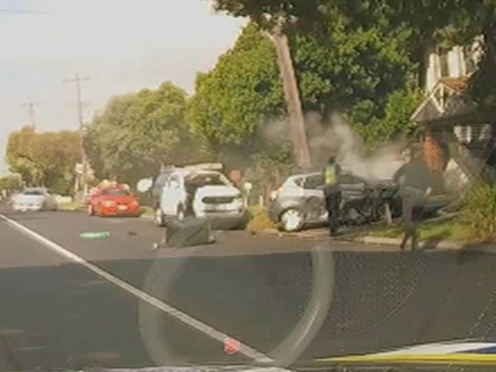 Police had their guns drawn after Abdirahman Basa crashed the stolen car into a power pole following a wild pursuit across Melbourne's west. Picture: Supplied.