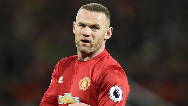 Manchester United's English striker Wayne Rooney is pictured during the English Premier League football match between Manchester United and Liverpool at Old Trafford in Manchester, north west England, on January 15, 2017. / AFP PHOTO / Oli SCARFF / RESTRICTED TO EDITORIAL USE. No use with unauthorized audio, video, data, fixture lists, club/league logos or 'live' services. Online in-match use limited to 75 images, no video emulation. No use in betting, games or single club/league/player publications. /