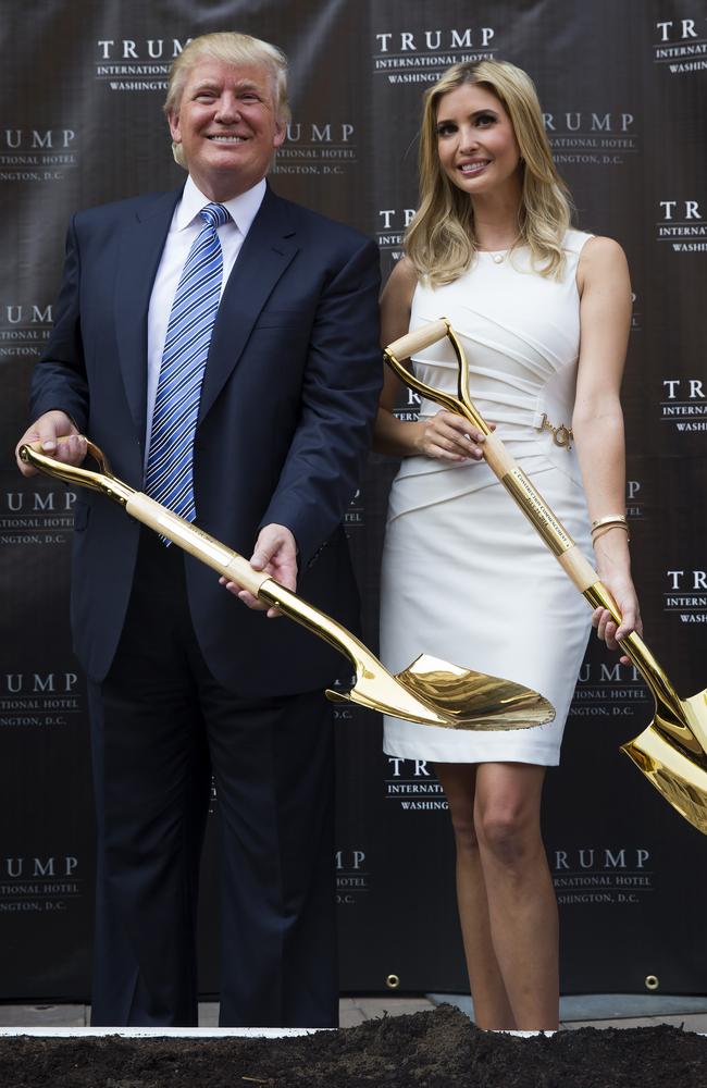 Born rich ... father and daughter pose for photographs during a ceremony for the Trump International Hotel on the site of the Old Post Office in Washington. Picture: AP