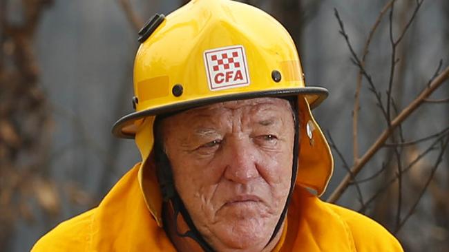 Victorian Fires Special. Mallacoota fire recovery feature. CFA firefighter Lindsay McHugh from South Morang, takes a break from checking smoldering trees near the town.   Picture: David Caird