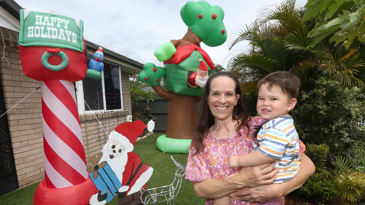 Brigit Daymond and Grandson Lincoln Tawhara with Christmas lights at her Nerang Home. Pic: Mike Batterham