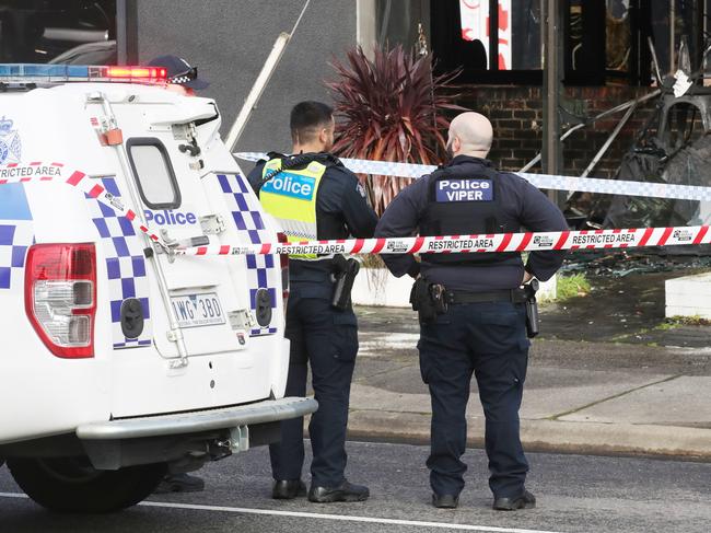 Police at the scene of Fighters Xpress gym. Picture: David Crosling