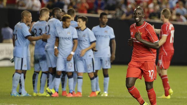 Liverpool defender Mamadou Sakho (17) enjoys the win.