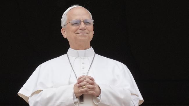 Pope Leo XIV appears at the central balcony of St. Peter's Basilica for his first Sunday blessing after his election, in St. Peter's Square at the Vatican. Picture: AP Photo/Gregorio Borgia