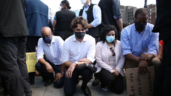 Canadian Prime Minister Justin Trudeau takes a knee during in a Black Lives Matter protest on Parliament Hill in Ottawa, Canada.