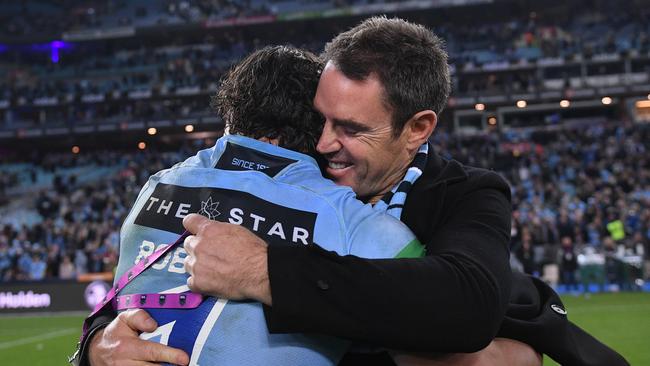 NSW Blues coach Brad Fittler (right) celebrates with James Roberts. Photo: AAP