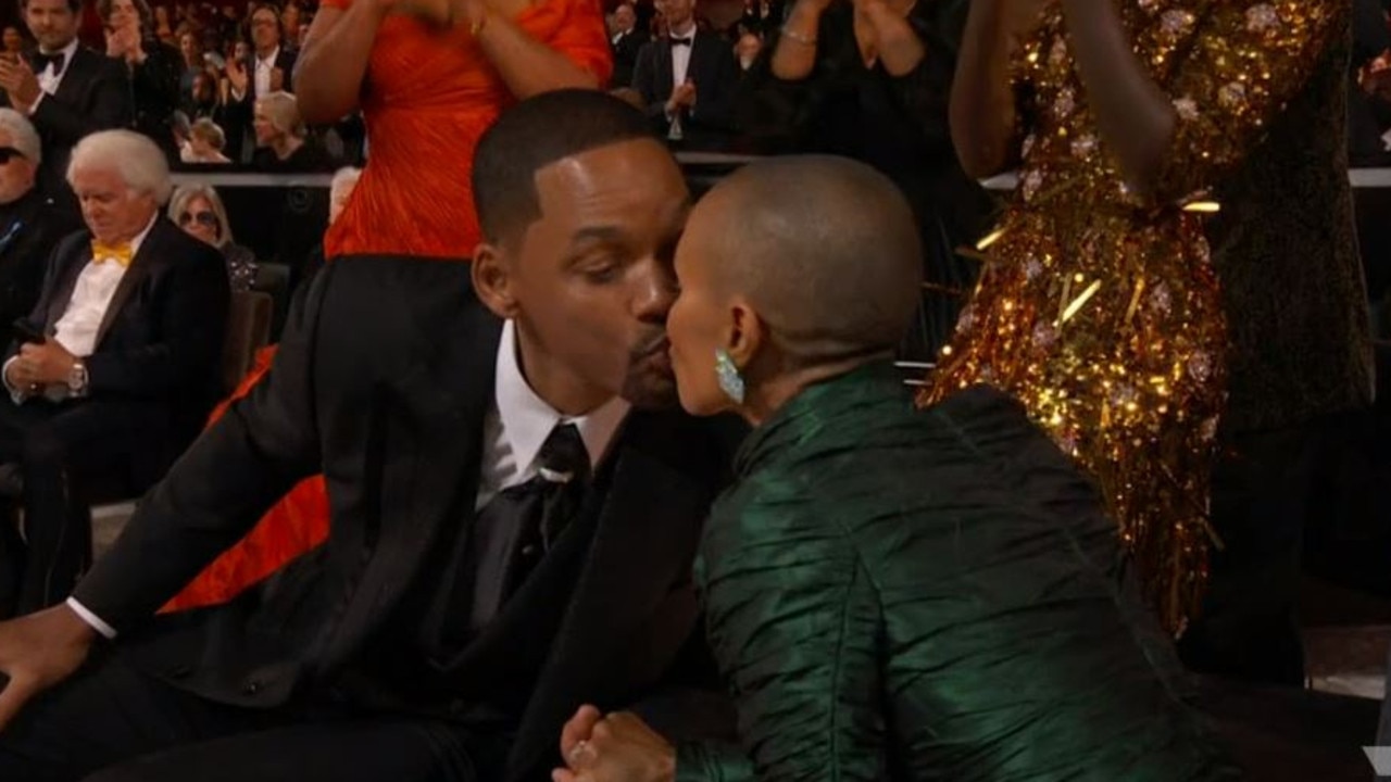 Will kisses Jada as his win is announced.