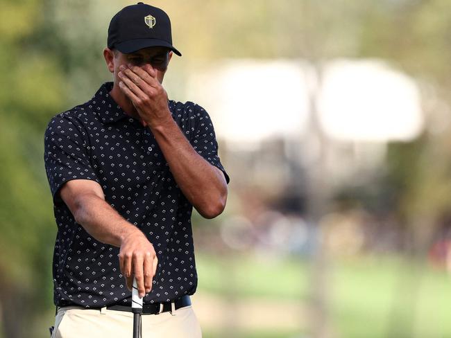 MONTREAL, QUEBEC - SEPTEMBER 26: Adam Scott of Australia and the International Team reacts after a putt on the 14th green during Thursday's Four-ball matches on day one of the 2024 Presidents Cup at The Royal Montreal Golf Club on September 26, 2024 in Montreal, Quebec, Canada.   Jared C. Tilton/Getty Images/AFP (Photo by Jared C. Tilton / GETTY IMAGES NORTH AMERICA / Getty Images via AFP)