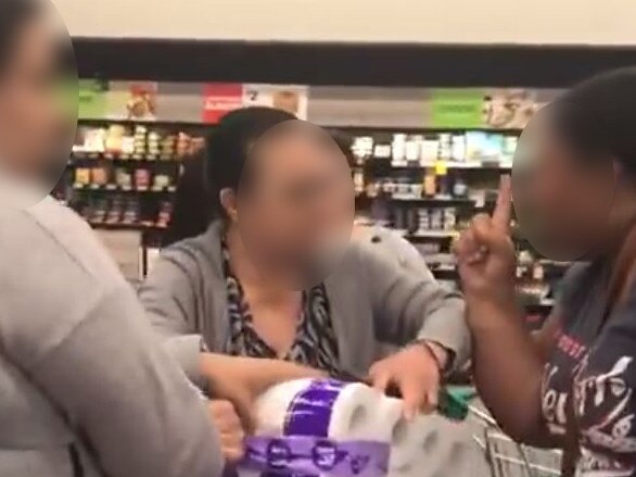 Shoppers fight over toilet rolls in Woolworths Chullora at the height of the panic buying craze. Picture: Twitter