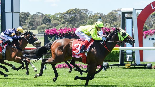 Yogi, ridden by Craig Williams, wins the 2018 Sandown Cup.