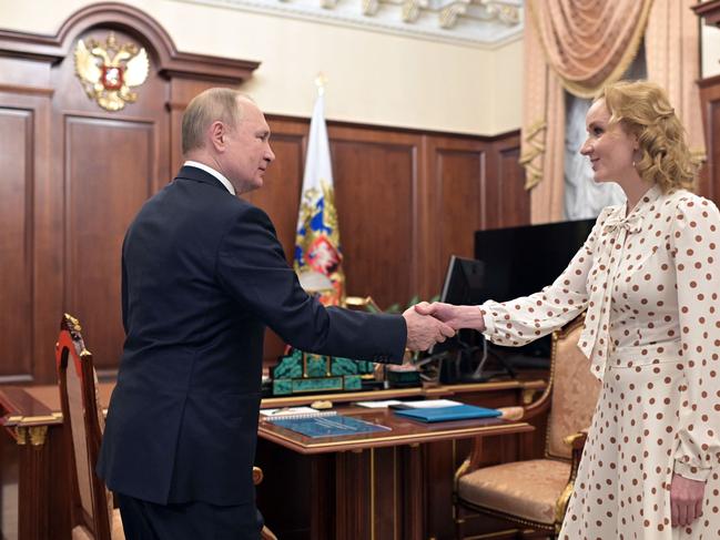 Mr Putin meets Russian Commissioner for Children's Rights Maria Lvova-Belova at the Kremlin on March 9. Picture: Sputnik /AFP