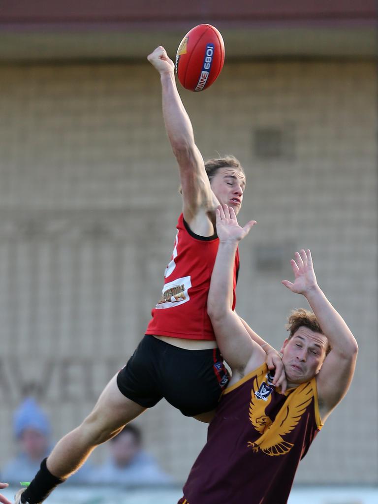 Wimmera Football League round 7 match between Stawell Warriors and Warrack Eagles. Stawell 13. 8 (84) defeated Warracknabeal 11. 13 (79). Jakob Salmi goes to punch the ball away from Jack Wilson. Picture: Yuri Kouzmin