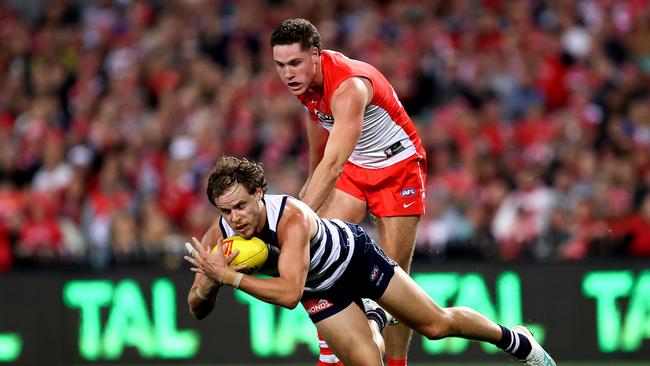 Jake Kolodjashnij takes an intercept mark in front of Sydney’s Hayden McLean. Picture: Brendon Thorne/AFL Photos/via Getty Images