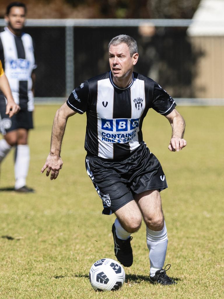 Scott May looks for options for Willowburn against Dalby Tigers in Div 2 Men FQ Darling Downs Presidents Cup football at West Wanderers, Sunday, July 24, 2022. Picture: Kevin Farmer