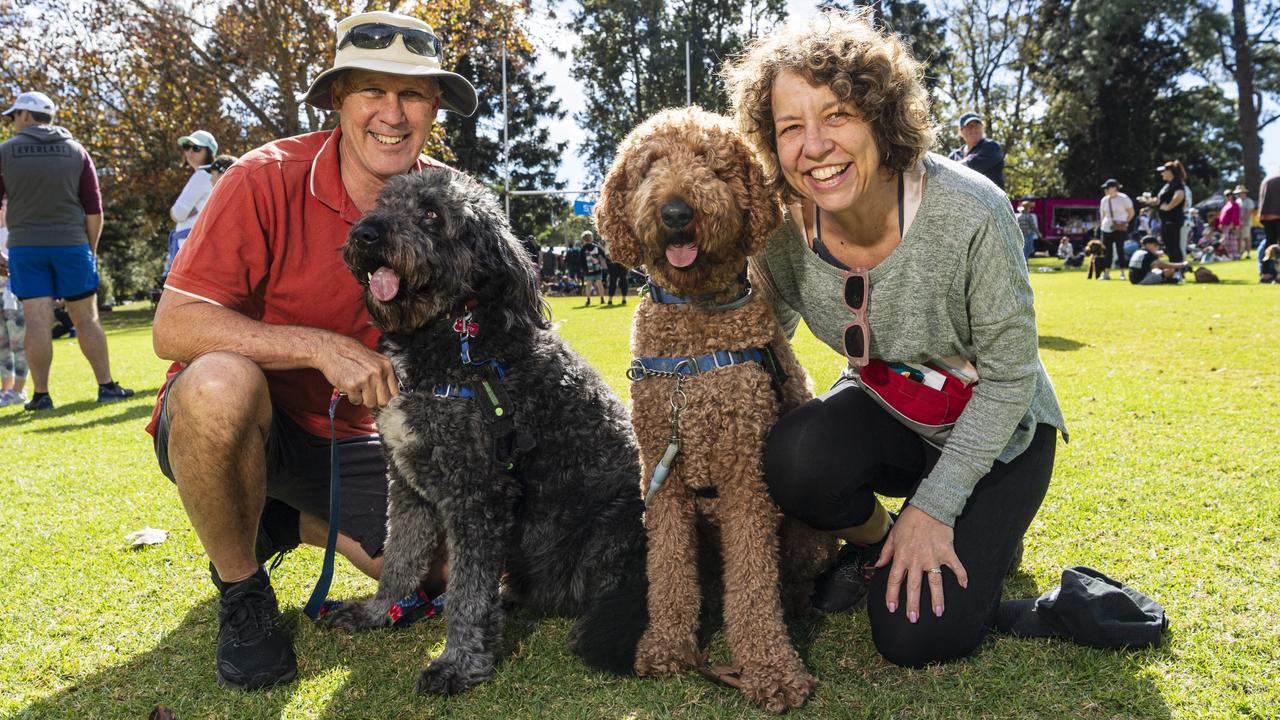 Andrew Tennent with bordoodle Winston and Lisa Hudson with groodle Humphrey at Toowoomba's Million Paws Walk at Queens Park, Friday, May 24, 2024. Picture: Kevin Farmer