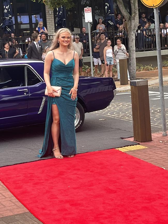 The students of Urangan State High School arrive at their formal.