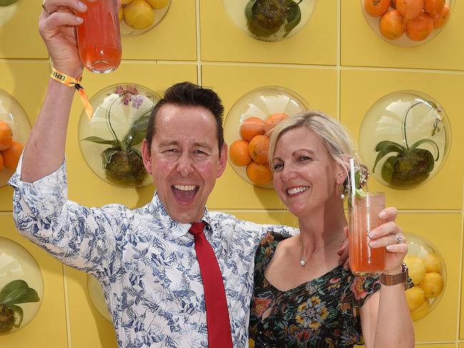 MELBOURNE, AUSTRALIA - NewsWire Photos, NOVEMBER 7, 2023. All the colour and excitement from the race that stops a nation. Steve (wearing shorts) and Kate Plarre at the Schwepps marquee. Picture: NCA NewsWire / Josie Hayden