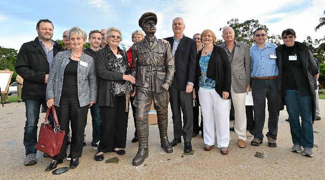 FAMILY GATHERING: Descendants of Maryborough soldier Duncan Chapman, the first man to step ashore at Gallipoli on April 25, 1915, pose for photos at his memorial statue in Queens Park. Picture: Alistair Brightman