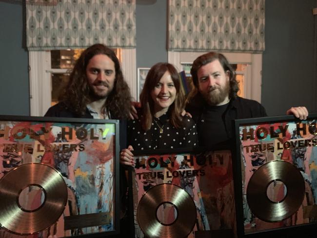 Jess Beston manger of Holy Holy with band members, Oscar Dawson (L) and Timothy Carroll (R) Picture: Supplied