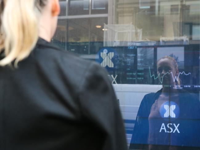 SYDNEY, AUSTRALIA - NewsWire Photos -MARCH 15 2022:  A general view of the latest market movements at the Australian Stock Exchange in Sydney as the impact of Russia's invasion of Ukraine is felt across the world economy. Picture NCA Newswire/ Gaye Gerard