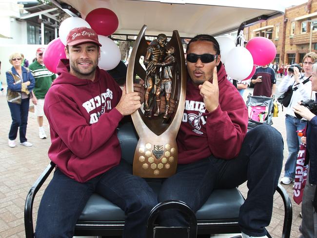 NRL – The Manly Sea Eagles parade through the streets of Manly after last weekend's Grand Final win over the Warriors. Brett Stewart and Steve Matai with the premiership trophy.