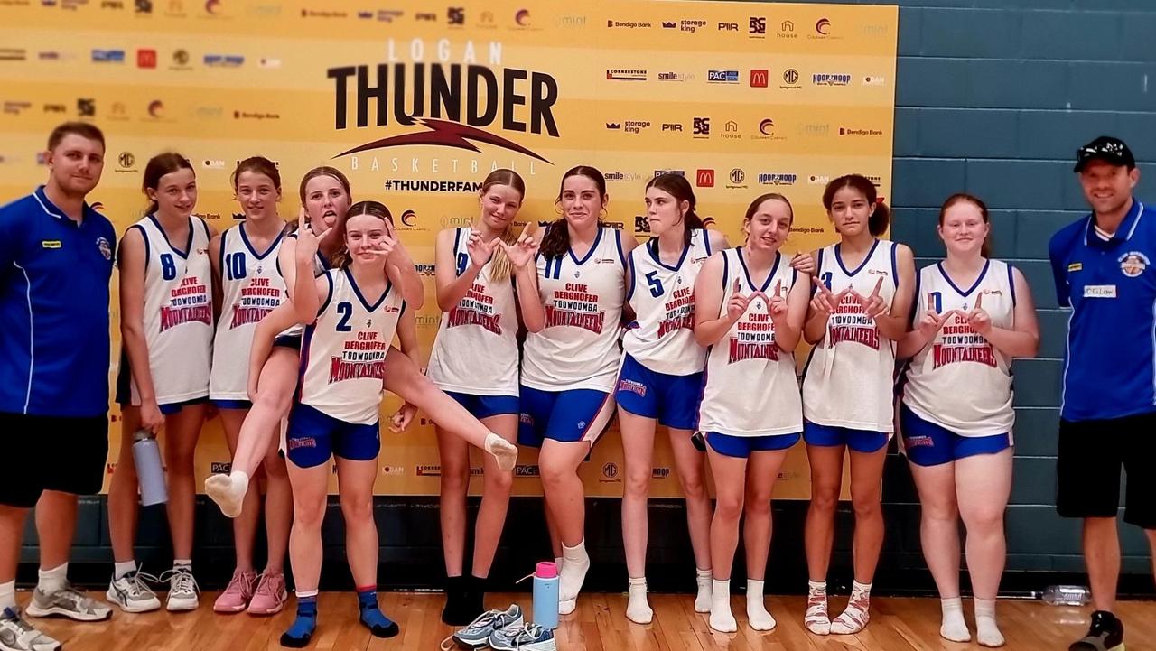 The Toowoomba Mountaineers under-16 girls squad celebrate a win.