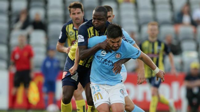 Kalifa Cisse crunches Bruno Fornaroli. Picture: Getty