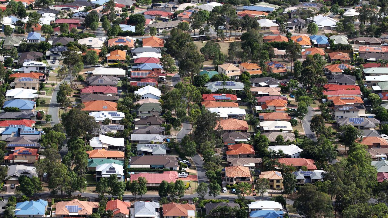 Aerial images of suburban house in South-West Brisbane. Generic houses, roof, solar panel, leafy suburb.