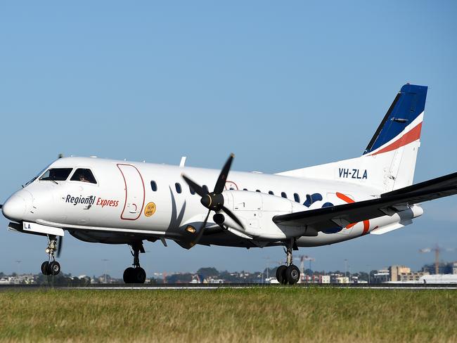 A Regional Express (REX) Saab 340B aircraft is seen landing at Sydney Domestic Airport, Monday, Nov. 16, 2015. (AAP Image/Dan Himbrechts) NO ARCHIVING