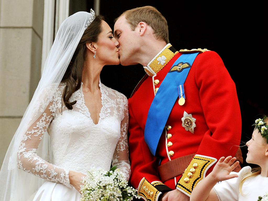 Kate and William shared a kiss after their wedding. Picture: AFP Photo/Pool/John Stillwell