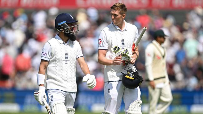 Zak Crawley (C) and Moeen Ali (L) have put on more than 50 for the second wicket.