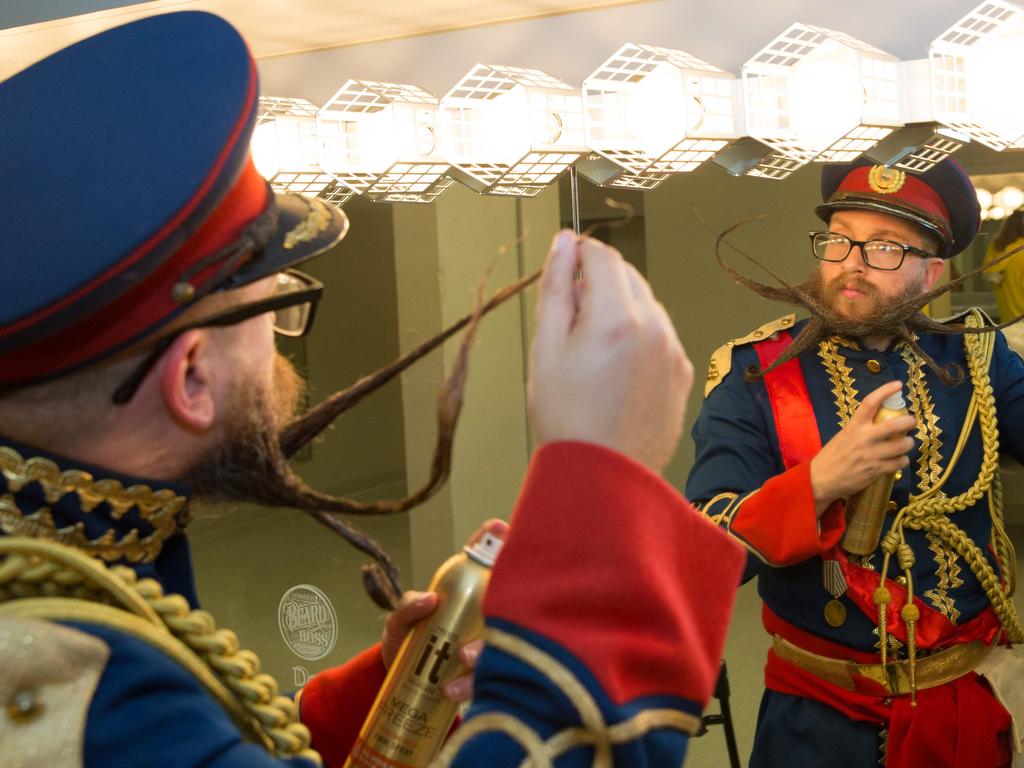 A competitor prepares his beard during the 2017 Remington Beard Boss World Beard and Moustache Championships held at the Long Center for the Performing Arts on September 3, 2017 in Austin, Texas. PIcture: AFP