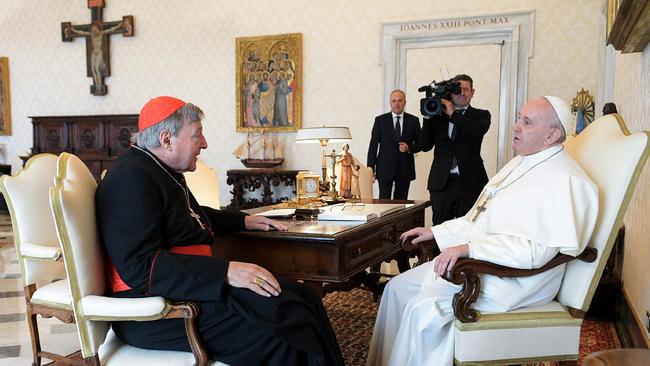 Pope Francis talks with Cardinal George Pell during a private audience at the Vatican this week.