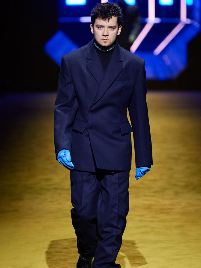 Asa Butterfield walking for Prada.