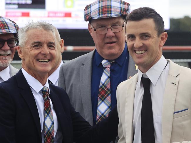 KEMBLA GRANGE, AUSTRALIA - NOVEMBER 20:  Robert  and Luke Price pose after winning the Gong with  Count De Rupee during Sydney Racing at Kembla Grange Racecourse on November 20, 2021 in Kembla Grange, Australia. (Photo by Mark Evans/Getty Images)