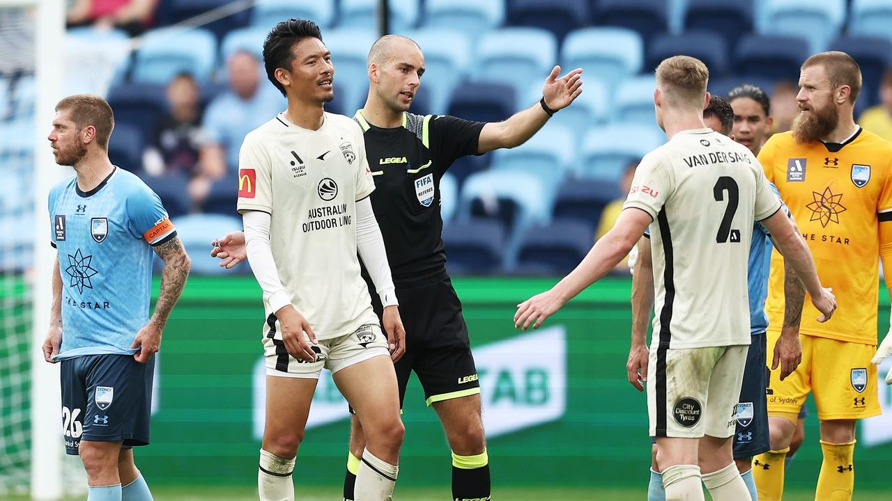 SYDNEY, AUSTRALIA - OCTOBER 23: Hiroshi Ibusuki of United is given a red card by referee Daniel Elder during the round three A-League Men's match between Sydney FC and Adelaide United at Allianz Stadium, on October 23, 2022, in Sydney, Australia. (Photo by Matt King/Getty Images)